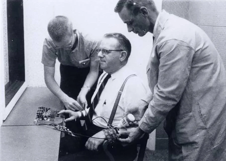Illustration of the Milgram experiment showcasing the influence of authority bias in participants' actions.
