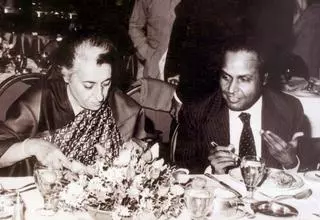 An image of Dhirubhai Ambani with Indira Gandhi for a book review of James Crabtree's Billionaire Raj.