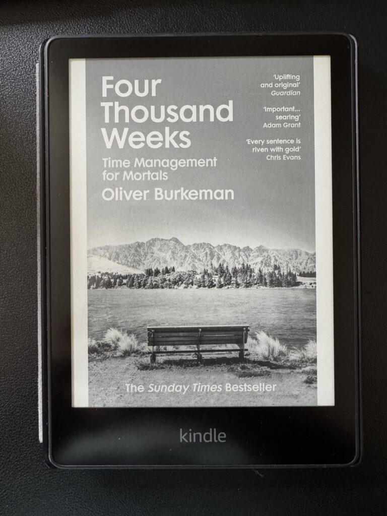 A kindle image of the book cover of four thousand weeks by oliver burkeman for the book review