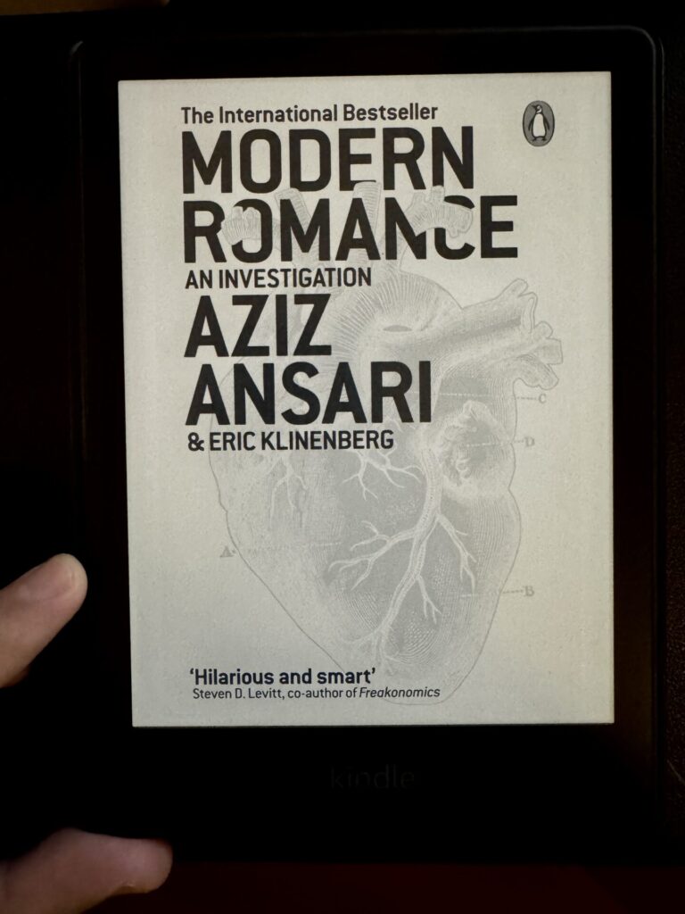 A kindle cover image of Modern Romance by Aziz Ansari for a book review written by Tapan Desai