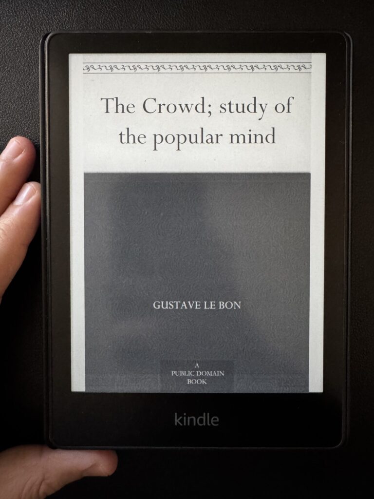 A kindle image of the cover of Crowd by Gustave Le Bon for a book summary, highlighting important lessons and the theory of gustave le bon's book.